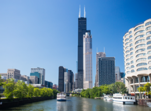 We thought the big picture of the Sears Tower with the giant letters spelling “HAHA” near the top sort of gave away the secret right away. I hope we didn’t make you spill your coffee.