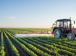 Proposals to tax fossil fuels or cap carbon dioxide emissions would raise the cost of many farm inputs, from fertilizer and other chemicals to fuel and motor oil.